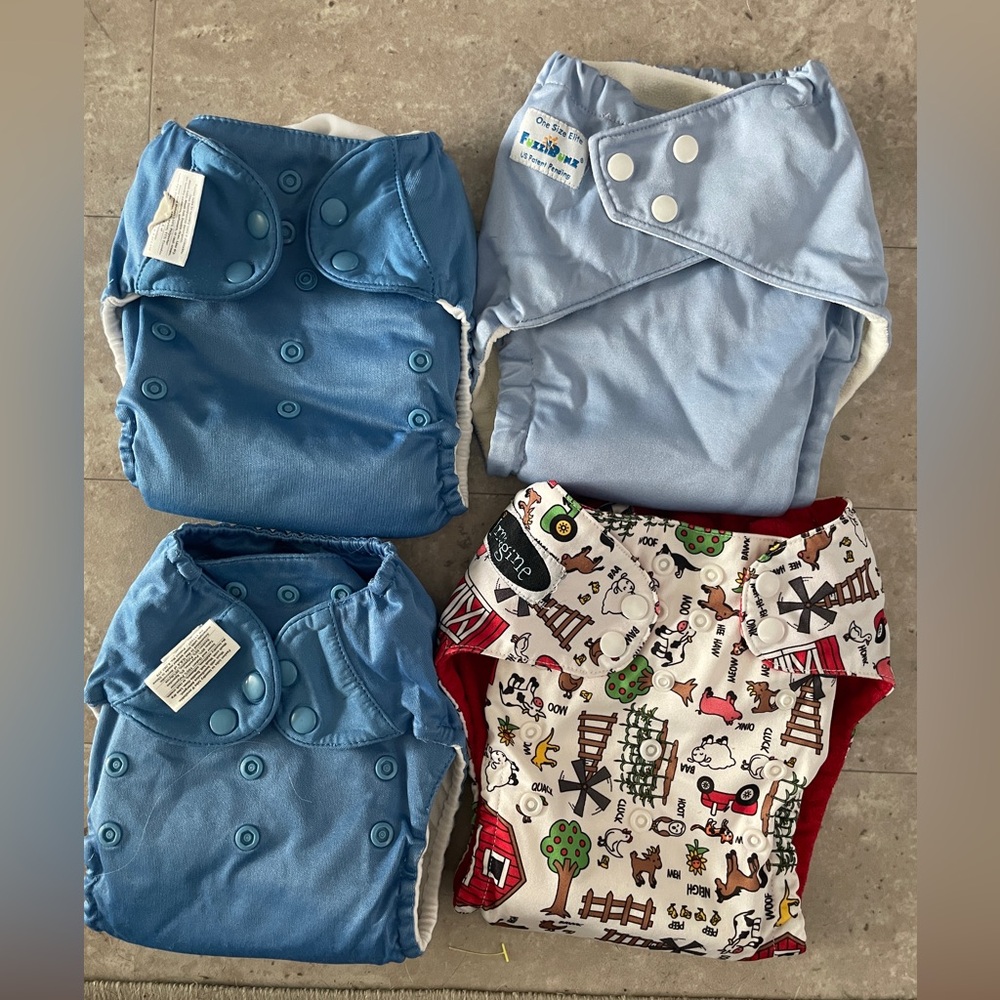 4 cloth reusable diapers bum genius and other brands